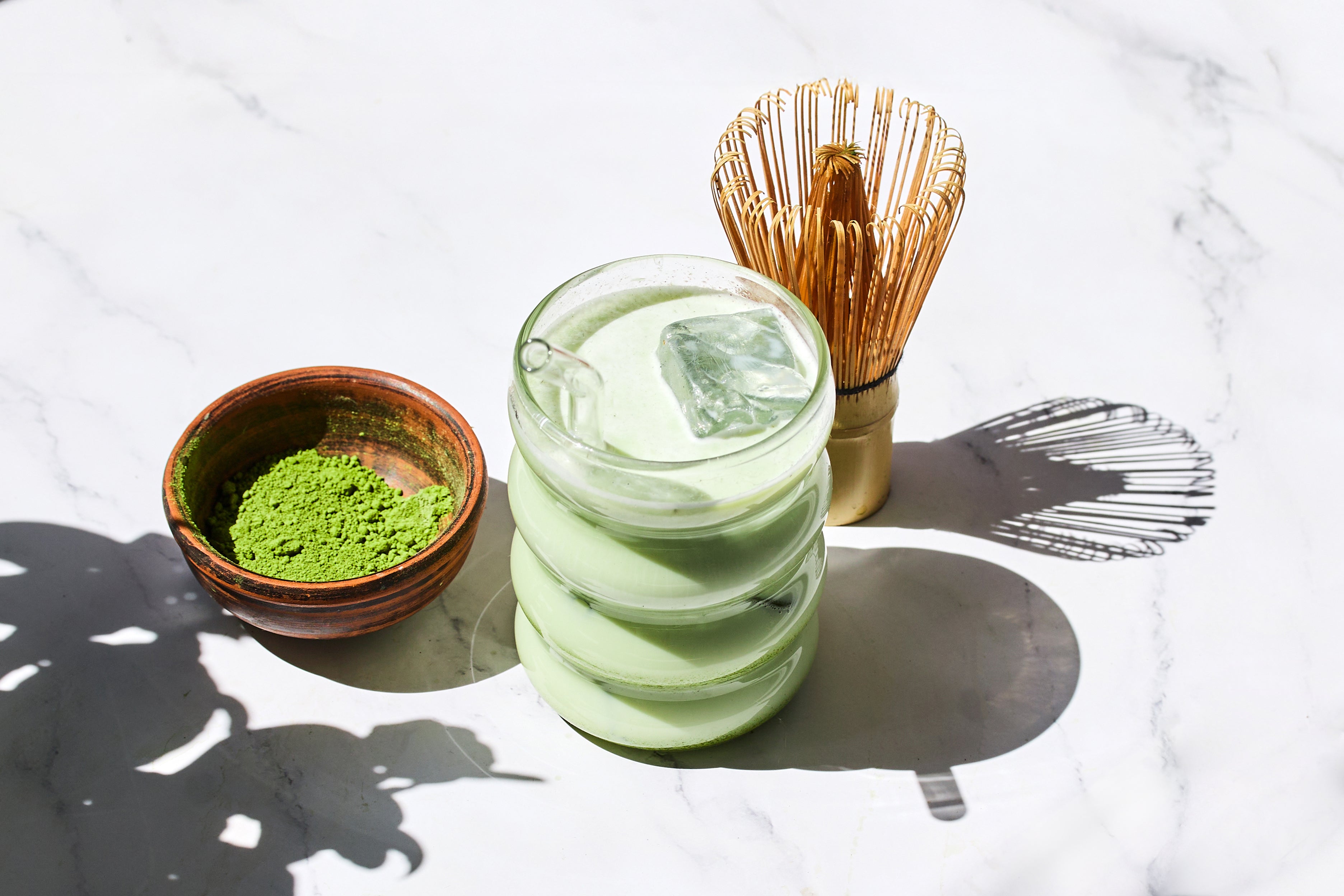 iced-matcha-refreshment-refreshing-iced-matcha-drinks-with-bamboo-whisk-matcha-powder_1.jpg